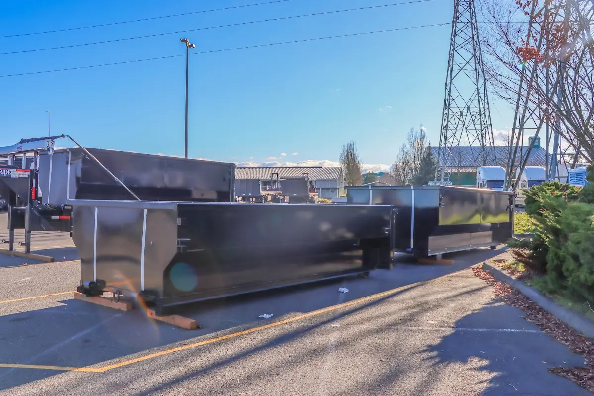 Roll-off dumpster ready for waste disposal at job site for Concrete Dumpster Rental in Crystal Lake